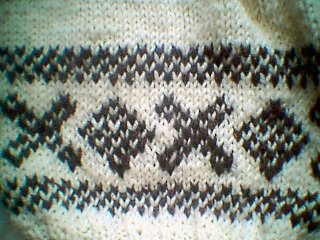 Helman ja hihansuiden mallineule 2